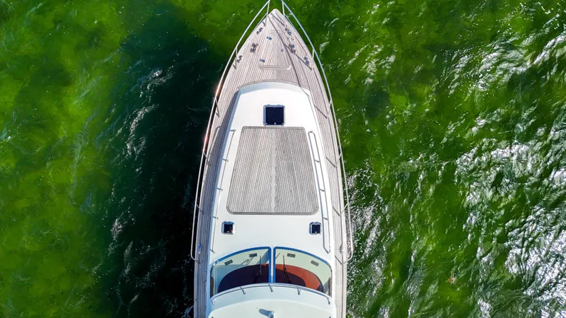 Yacht Photos Pics Overhead view of 2010 Revival 45 Gentlemans yacht on vibrant green water.