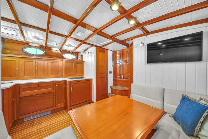  Yacht Photos Pics Luxurious interior of 2010 Revival 45 Gentlemans yacht with wood finish and modern amenities.