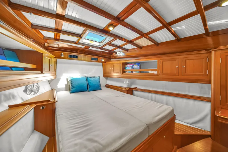  Yacht Photos Pics Luxurious 2010 Revival 45 Gentlemans yacht cabin with wood finish and skylight.