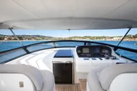 Luxurious 2009 Maiora 31 yacht cockpit with scenic ocean view.