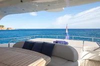Luxurious Maiora 31 yacht deck with ocean view, featuring comfortable seating and elegant design, 2009 model.