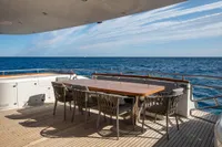 Luxury Maiora 31 yacht deck with dining table, ocean view, 2009 model.