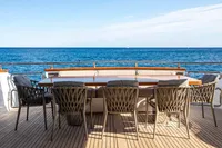 Luxury yacht Maiora 31 (2009) deck with ocean view and elegant seating arrangement.
