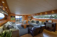 Luxurious Maiora 31 yacht interior, 2009 model, featuring elegant seating and large windows.