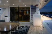 Luxurious 2009 Maiora 31 yacht deck with elegant seating and ambient lighting.