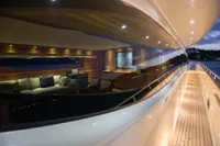 Luxurious 2009 Maiora 31 yacht interior with elegant lighting and sleek wooden deck.