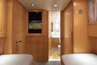 Luxurious Maiora 31 yacht cabin interior with twin beds and en-suite bathroom, 2009 model.