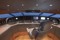 Luxurious Maiora 31 yacht helm, 2009 model, featuring advanced navigation systems and sleek design.
