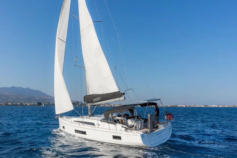  Yacht Photos Pics 2020 Beneteau Oceanis 46.1 sailing on open sea under clear blue sky.