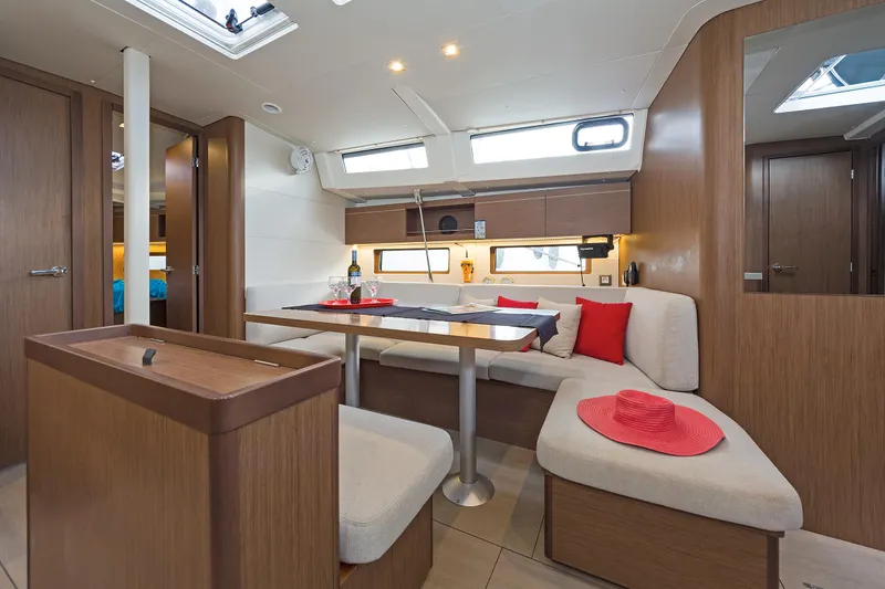  Yacht Photos Pics Interior of 2020 Beneteau Oceanis 46.1 yacht with modern seating and dining area.