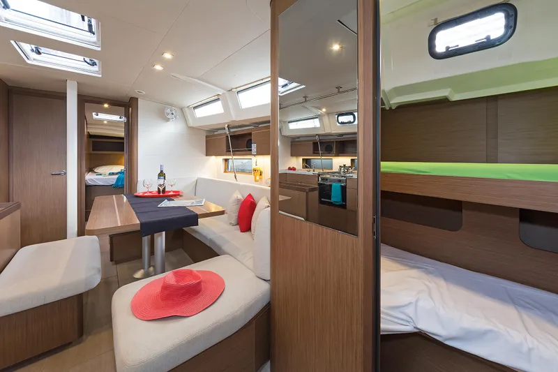  Yacht Photos Pics Interior of 2020 Beneteau Oceanis 46.1 yacht, featuring cozy seating and modern design.