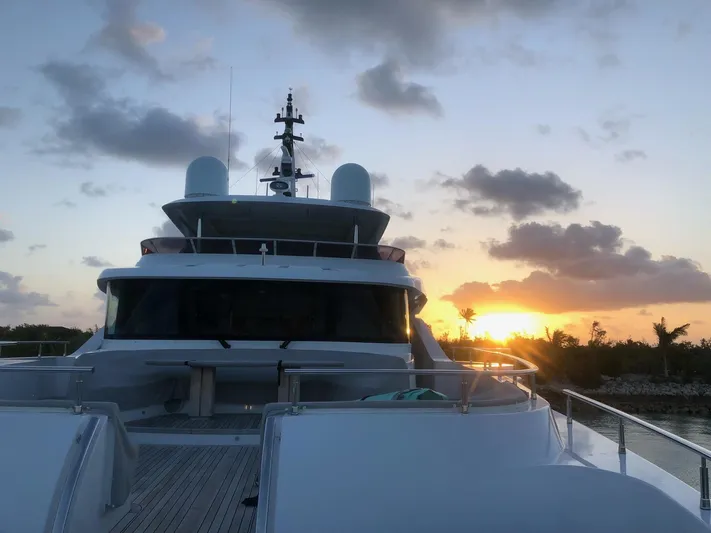  Yacht Photos Pics Majesty 140 yacht at sunset, 2026 model, with scenic ocean view.