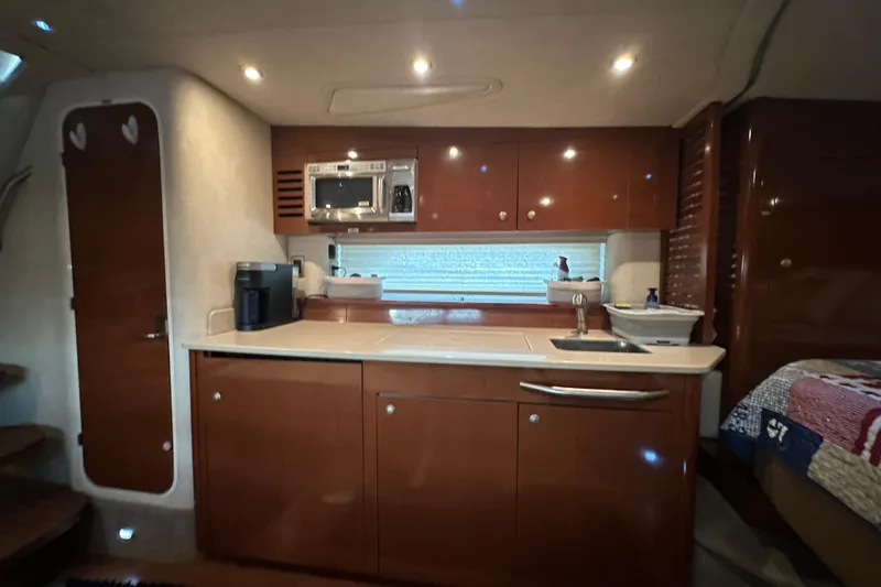  Yacht Photos Pics Luxurious 2009 Sea Ray 350 Sundancer yacht interior with modern kitchen amenities.