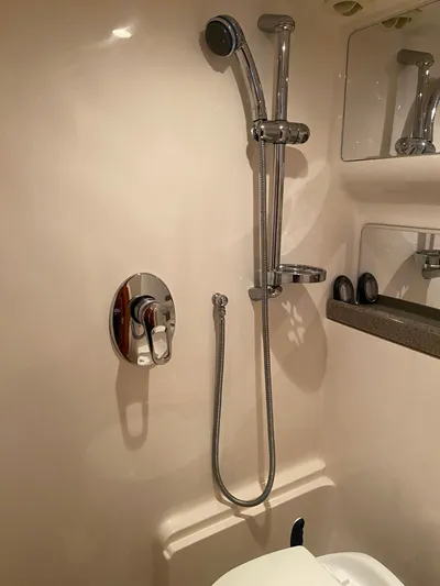 Show Me Yacht Photos Pics Shower area in 2011 Regal 42 Sport Coupe yacht bathroom.