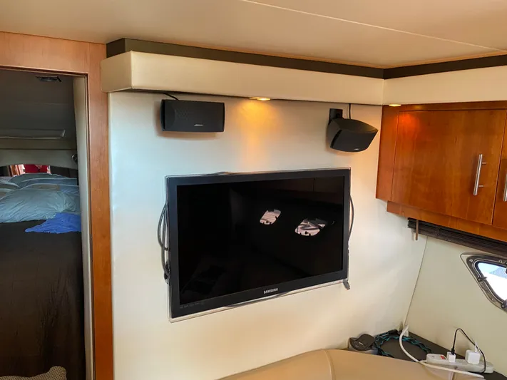 Show Me Yacht Photos Pics Interior of 2011 Regal 42 Sport Coupe with TV and speakers.