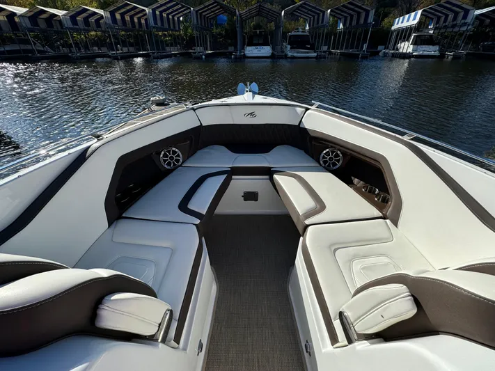 Amoore Yacht Photos Pics 2018 Monterey 328 Super Sport boat interior with luxurious seating and waterfront view.