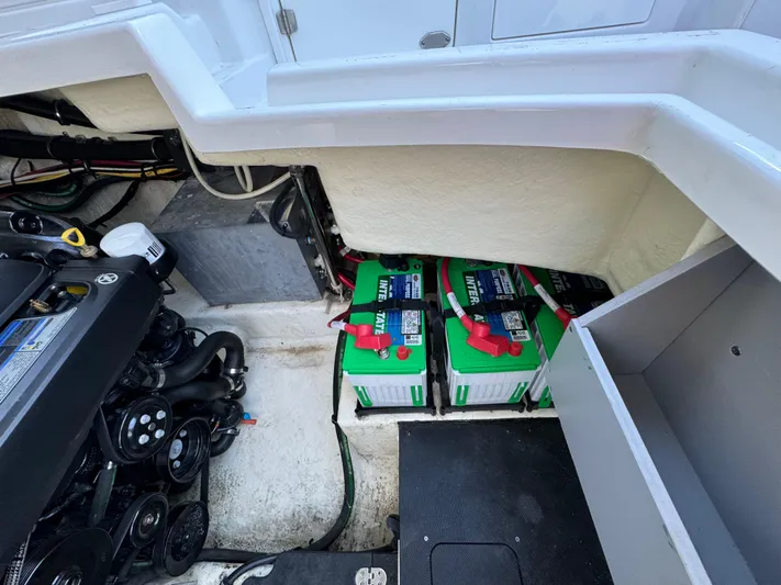 Amoore Yacht Photos Pics Engine compartment of a 2018 Monterey 328 Super Sport with visible batteries and wiring.