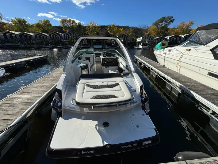 Amoore Yacht Photos Pics 2018 Monterey 328 Super Sport boat docked at marina, rear view.