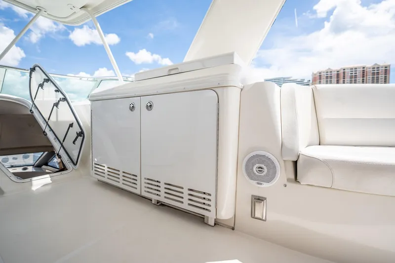 Sound Traveler Yacht Photos Pics 2005 Carver 56 Voyager yacht interior with white seating and storage cabinets.