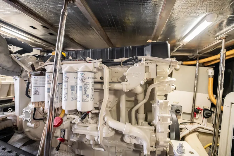 Sound Traveler Yacht Photos Pics Engine room of 2005 Carver 56 Voyager yacht, showcasing detailed mechanical components.