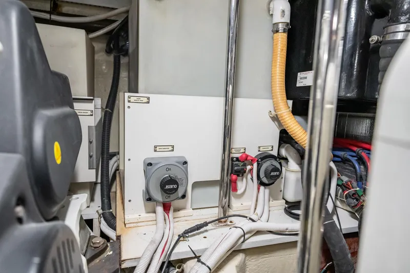 Sound Traveler Yacht Photos Pics Engine room of 2005 Carver 56 Voyager yacht, featuring electrical components and wiring.