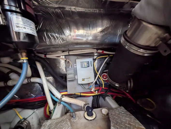 Dakota Silver Yacht Photos Pics Engine compartment of a 2006 Meridian 368 with wiring and components.