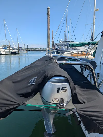 Dakota Silver Yacht Photos Pics Outboard motor on a 2006 Meridian 368 yacht docked at a marina.