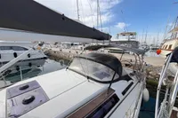 2014 Hanse 345 sailboat docked at marina, featuring sleek design and spacious deck.