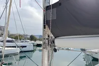 Sailboat Hanse 345 (2014) docked in a marina, surrounded by other boats.