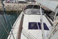 2014 Hanse 345 sailboat docked, featuring a sleek deck and modern design.