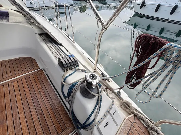 Sunshine Yacht Photos Pics Hanse 345 sailboat deck with winch and ropes, 2014 model, docked at marina.