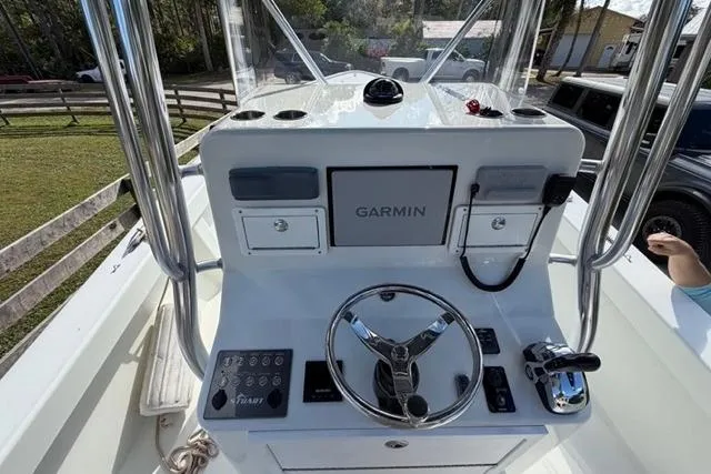  Yacht Photos Pics Center console of a 2017 Stuart 27 boat with Garmin navigation system.