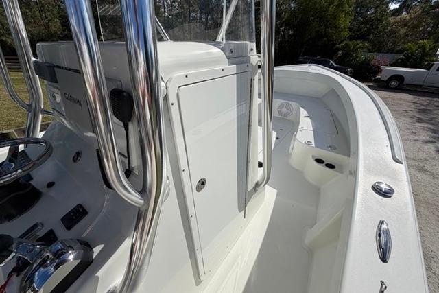 2017 Stuart 27 boat with sleek white deck and chrome details.