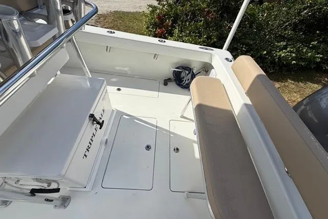  Yacht Photos Pics 2017 Stuart 27 boat interior with seating and storage compartments.