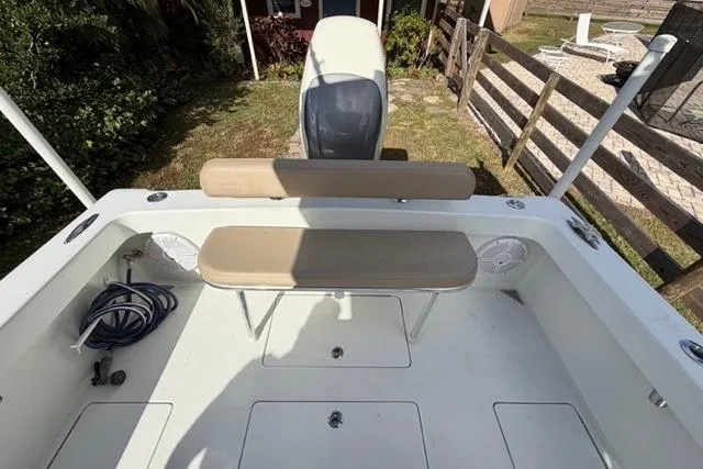  Yacht Photos Pics 2017 Stuart 27 boat interior with seating and storage compartments.