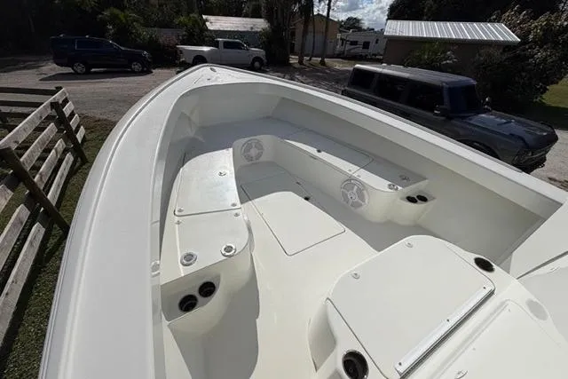  Yacht Photos Pics 2017 Stuart 27 boat interior with seating and storage compartments.