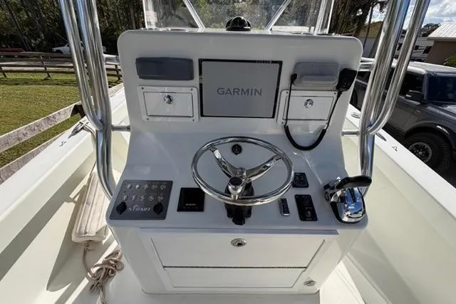  Yacht Photos Pics Control panel of a 2017 Stuart 27 boat featuring Garmin navigation system.