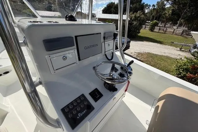  Yacht Photos Pics Control panel of a 2017 Stuart 27 boat with Garmin navigation system.