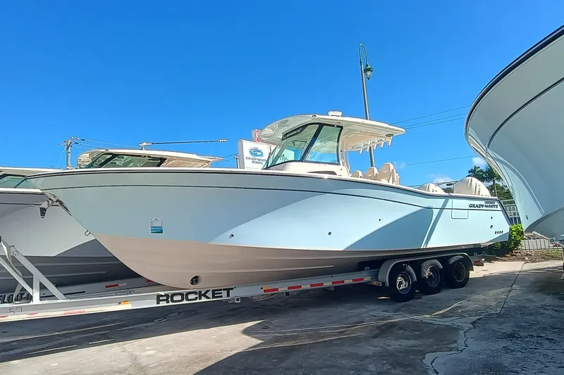 336-617 Yacht Photos Pics 2026 Grady-White Canyon 336 boat on trailer, blue sky.