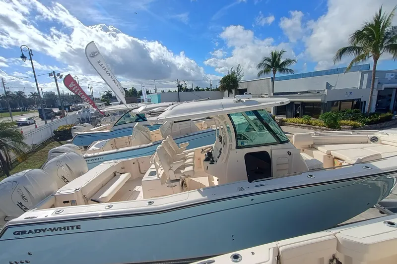 336-617 Yacht Photos Pics Grady-White Canyon 336 boat, 2026 model, displayed in a sunny showroom.