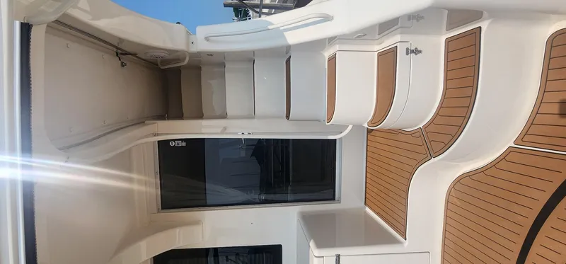  Yacht Photos Pics 2004 Silverton 48 Convertible yacht interior with sleek white and wood design.