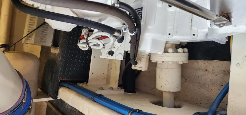  Yacht Photos Pics Engine room of 2004 Silverton 48 Convertible yacht, showing mechanical components and piping.