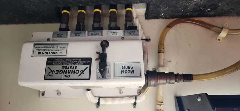  Yacht Photos Pics Oil change system in a 2004 Silverton 48 Convertible boat engine room.