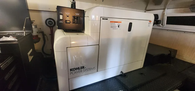  Yacht Photos Pics Kohler power system in 2004 Silverton 48 Convertible yacht engine room.