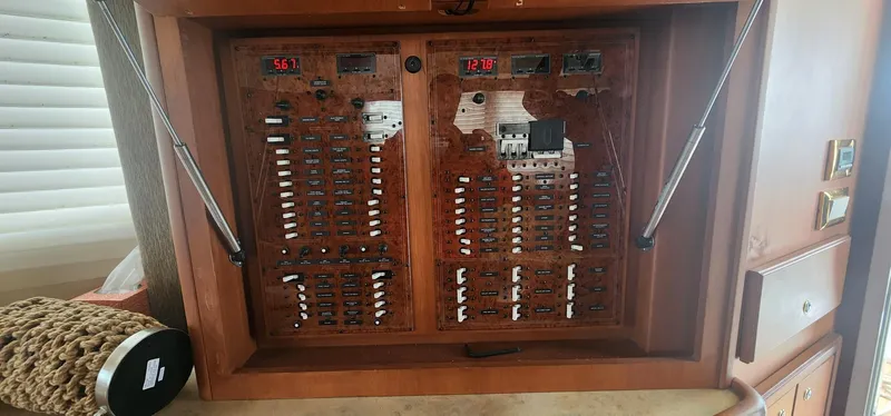  Yacht Photos Pics Electrical panel of a 2004 Silverton 48 Convertible yacht with switches and meters.