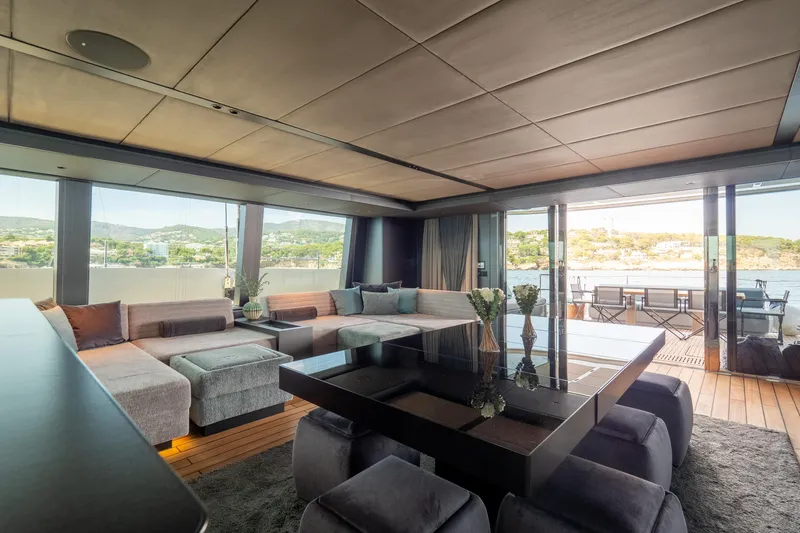 Shades Of Grey Yacht Photos Pics Luxurious interior of 2024 Sunreef 80 sailing yacht with elegant seating and panoramic views.