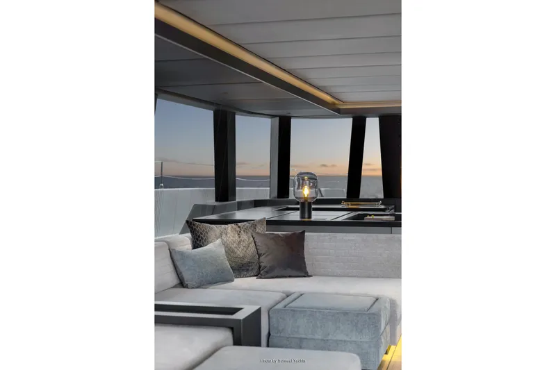 Shades Of Grey Yacht Photos Pics Luxurious interior of 2024 Sunreef 80 sailing yacht with modern decor and ocean view.