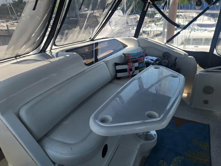 Nacho Boat Yacht Photos Pics Interior of 2000 Silverton 453 Motor Yacht with seating and table.