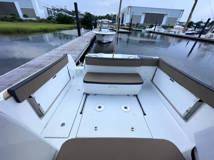 Inspector Gadget Yacht Photos Pics Jeanneau Merry Fisher 855 Marlin 2016 boat interior at marina dock.