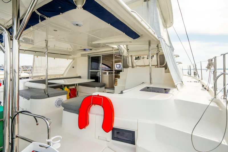 Grace Yacht Photos Pics Luxurious 2016 Leopard 48 yacht interior with seating and safety equipment.
